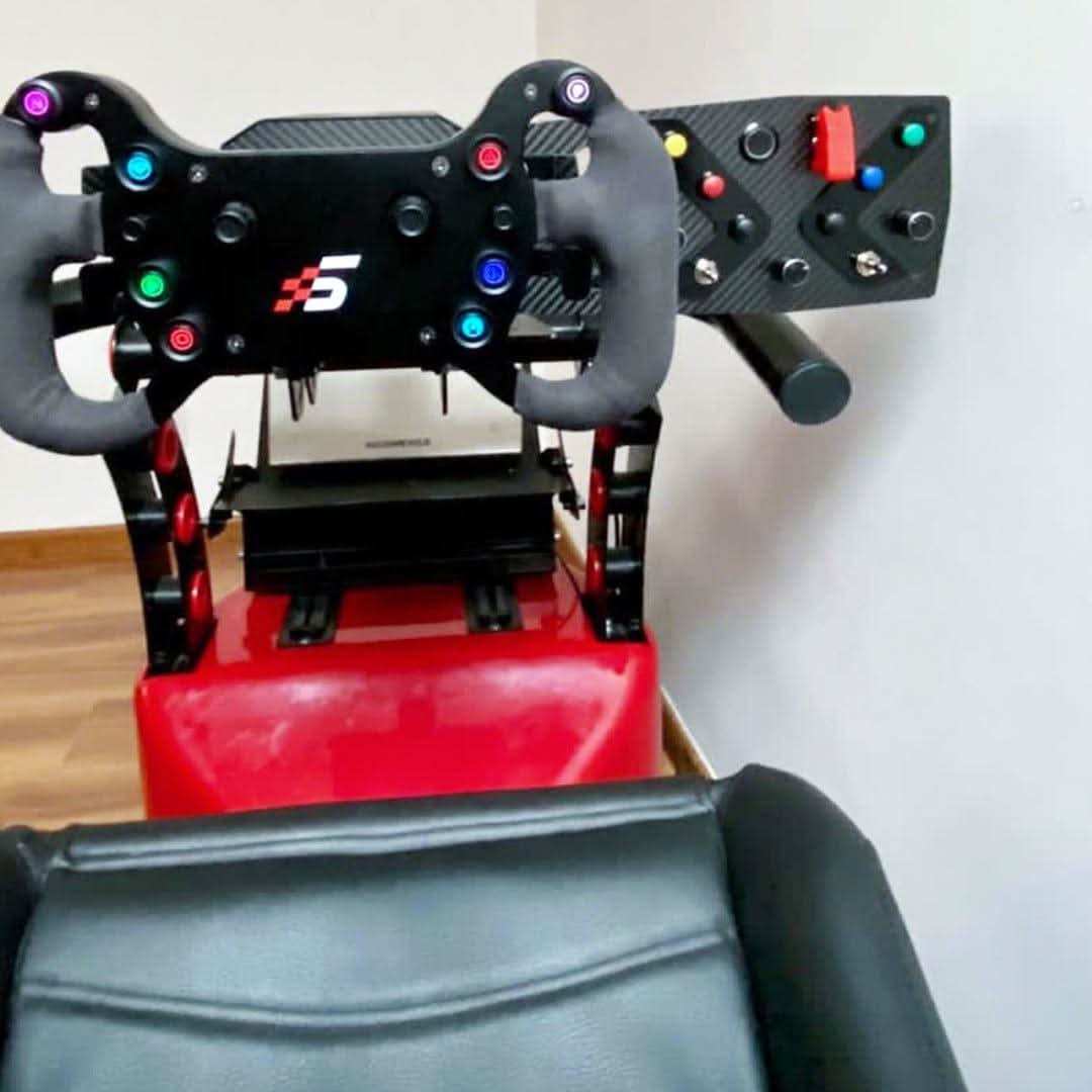 GTS Button Box Panel for Direct Drive by Racebox Sim Racing, carbon fiber panel with colorful pushbuttons.